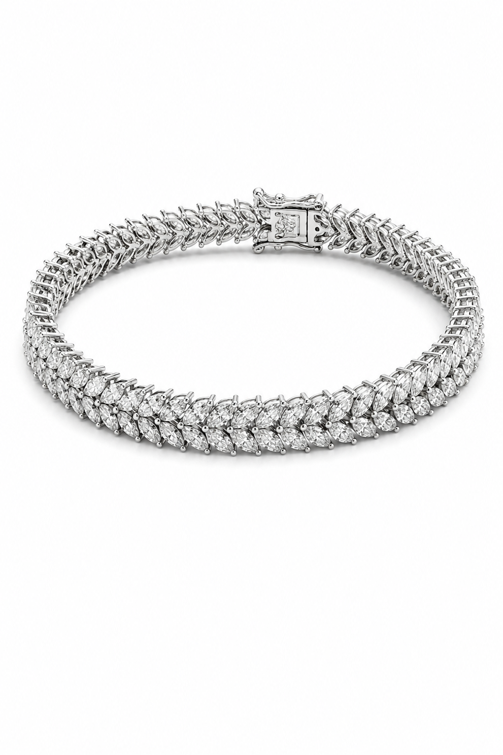 A silver tennis bracelet with a textured, woven chain design and a rectangular clasp, shown on a plain white background.