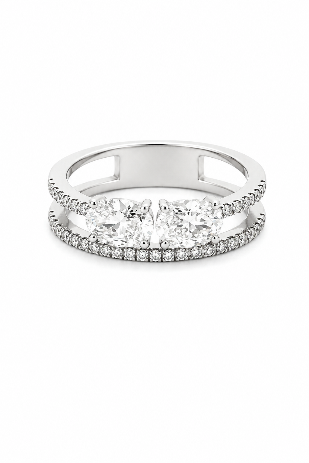 A silver-tone double-band ring featuring a center row of three princess-cut clear stones and pavé-set accent stones along the bands, shown on a plain white background.