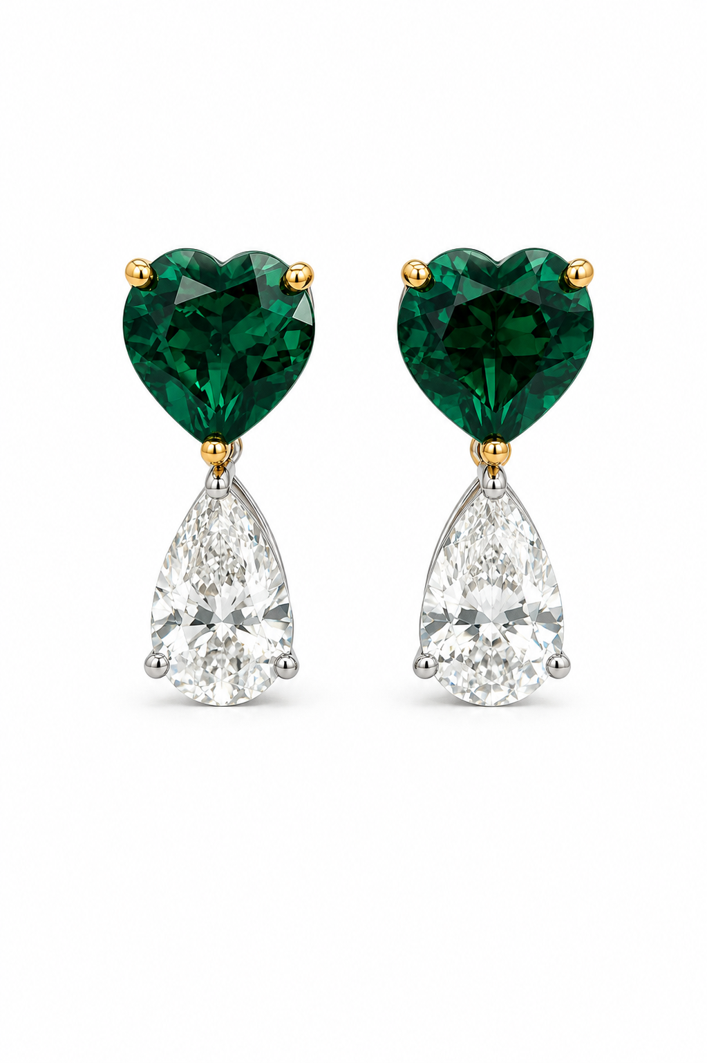 A pair of heart-shaped drop earrings featuring deep green heart-shaped gemstones at the top and pear-cut clear gemstones below, set in yellow gold and silver-toned metal on a white background.
