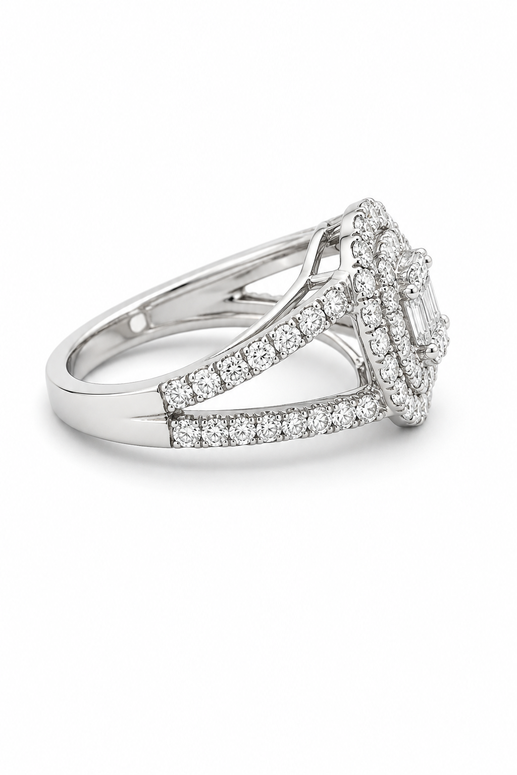 A silver-toned diamond ring with a cluster setting and pavé band, shown on a clean white background.