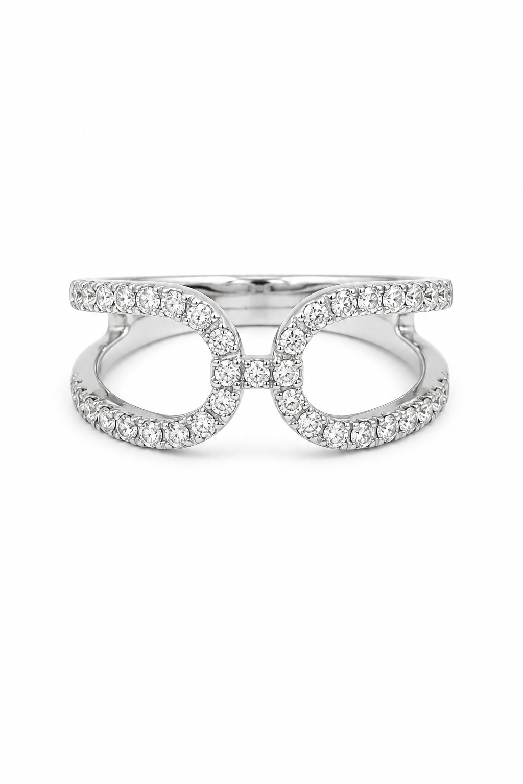 A silver-toned open bow ring adorned with pavé-set clear crystals, shown against a plain white background.